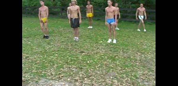  Several twinks exercise all-naked by the campsite